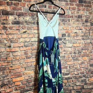 Gorgeous hi-low dress. Tropical flower bottom with white lace top.